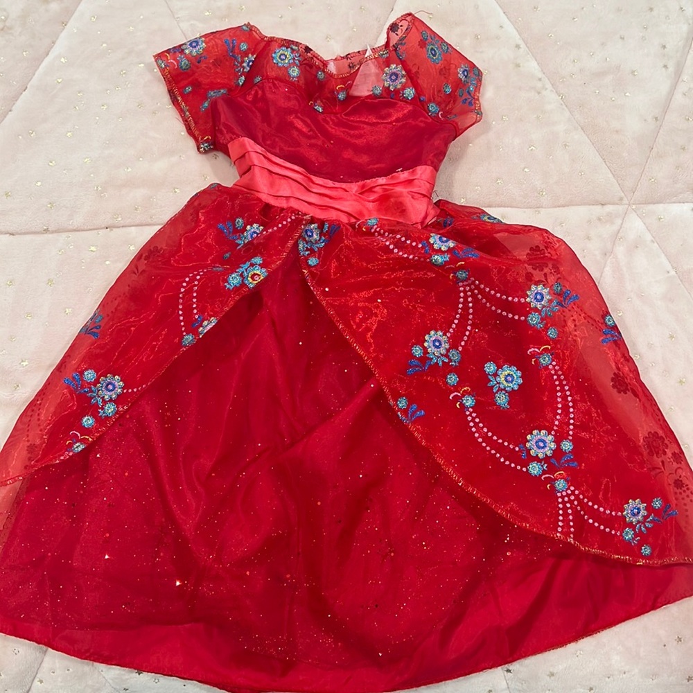4-6x Princess Elena costume. Does have button to light up skirt and sing